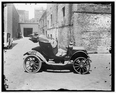 Which automaker introduced the world's first mass-produced electric car?