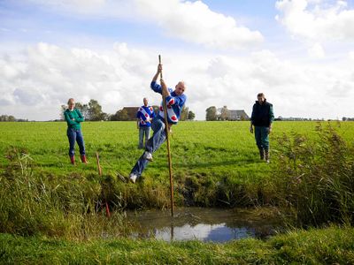 What is traditional sport of a Frisian minority in the West Friesland, Netherlands?