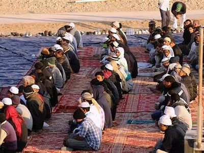 Which direction do Muslims face when praying?