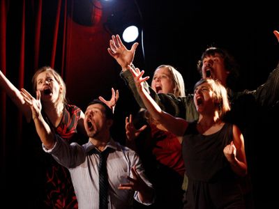 What is the purpose of improvisational theater?