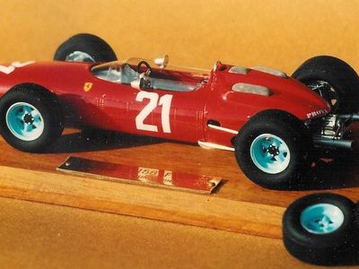 Which driver famously won the 1964 World Championship driving for Ferrari?