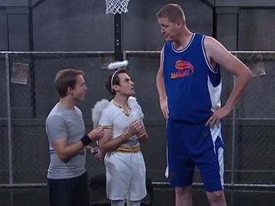 In one of the shoulder angel sketches, Matt climbs a 7' 6" man. What is his name?