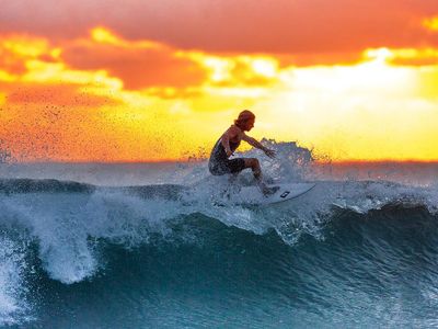 What is the term for the area of unbroken wave face that a surfer rides on?