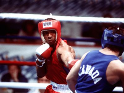 In which year was professional Boxing officially recognized as an Olympic sport?