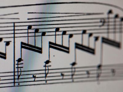 What does the term 'forte' mean in music?