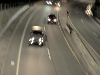 When should you use your headlights while driving on the highway?