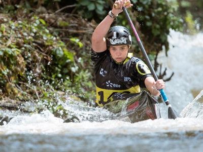 What does a buoyancy aid provide while canoeing?