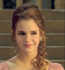 What SHADE of robes did Hermione wear to the Yule ball? (use capital letters for the beginning of a word)