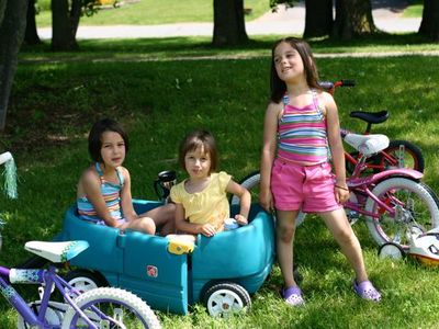 While in the park everyone gets tired of walking. The girls rented a little wagon so you can pull em in. You..