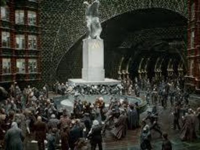 when harry Ron and hermione break into the ministry of magic which one of these ministry members now working for Voldemort chases them through the atrium hoping to catch them to hand them all over to Voldemort?