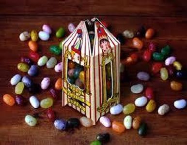 On the train Ron and Harry sit together. Ron is embarrassed that his mom packed him sandwiches. Harry buys everything off the trolly. Including Bertie Botts Every Flavor Jelly Beans. Ron mentions three flavors. What are two flavors he mentions