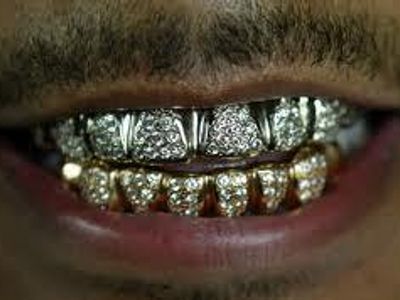 Which of these rappers have grills?