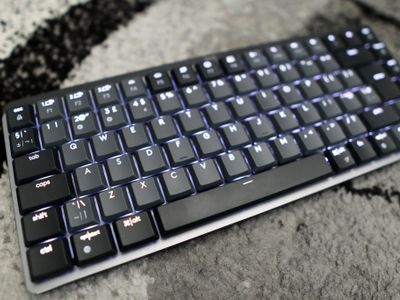 Which type of keyboard has keys that light up for better visibility in low-light environments?