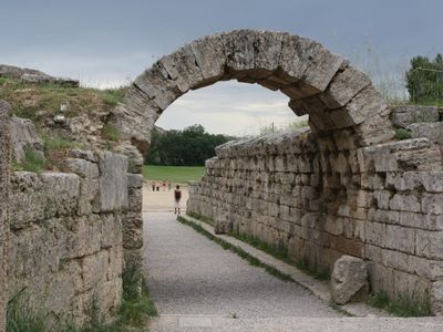 Where did the ancient Olympic Games originate?