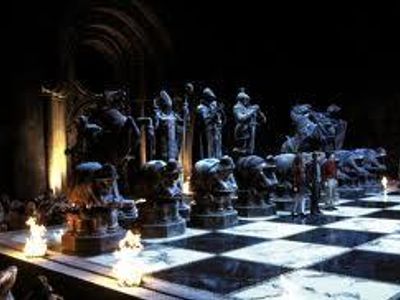 when leading harry and hermione in a game of wizards chess which position does Ron say he will take?