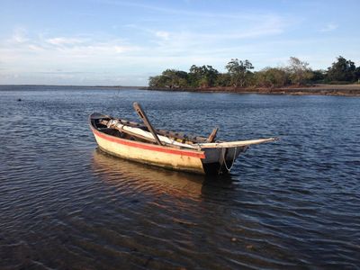 What is the term for a canoe specially designed for exploring lakes and calm rivers?