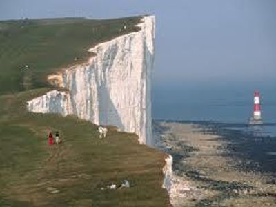 Willy is considering taking a boat over to Calais in France while he's in Europe, so he visits a port town which is dominated by the White Cliffs. He is told that he can catch the ferry across the English Channel from here. Where's Willy?