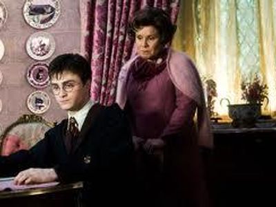 In harry potter and the order of the phoenix, what does umbridge make harry write as his punishment which gets engraved onto his hand?