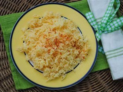 What is the popular Spanish dish of saffron-infused rice with various meats and seafood?