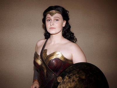 Which superhero movie follows the story of Diana, Princess of Themyscira?