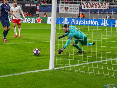 What happens if a goalkeeper handles the ball outside their penalty area?