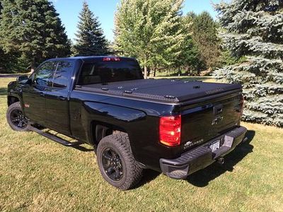 What is the purpose of a tonneau cover on a truck?