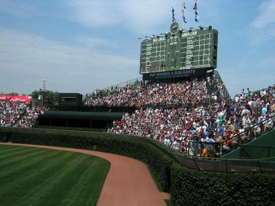 Which stadium is known for its ivy-covered outfield walls?