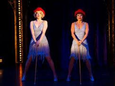 Which musical involves the characters Roxie Hart and Velma Kelly?