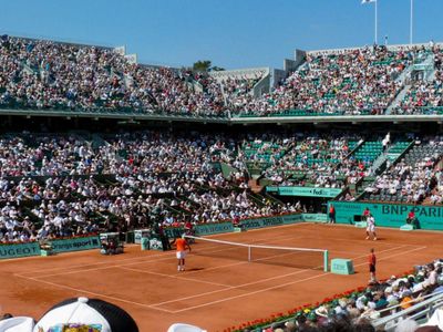 Which player has won the most French Open titles in the Open Era?