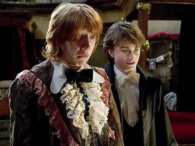 Why did Harry and Ron need dress robes?