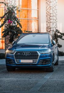 Which luxury car brand is known for its stylish and sporty models like the A5 and Q7?