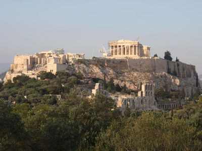 Which city is known for its cultural landscape featuring the ancient Acropolis?