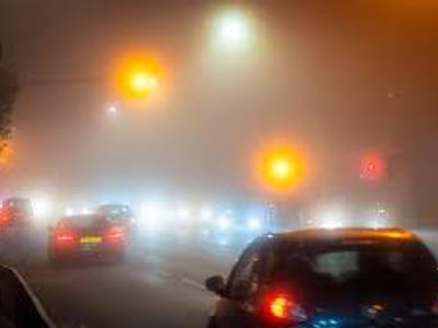 When driving in foggy conditions, what lights should you use?