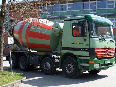 Which truck is designed for mixing and transporting concrete?