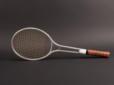 What material is used to make the strings of tennis rackets?