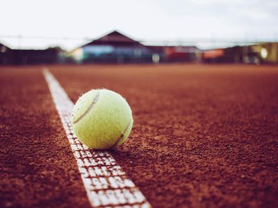 What is the term used when a ball lands on the line during a tennis match?