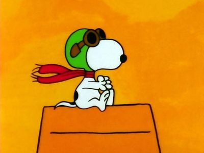 Which comic strip features a famous beagle named Snoopy?