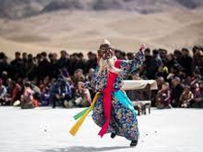 In which culture do people jump over bonfires as part of a love ritual during 'Losar'?