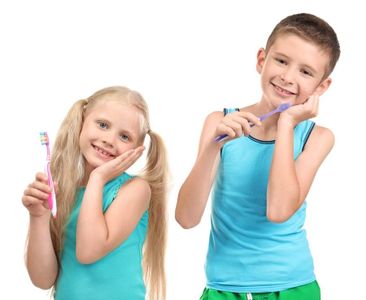 Which of the following habits contributes to good oral health in children?