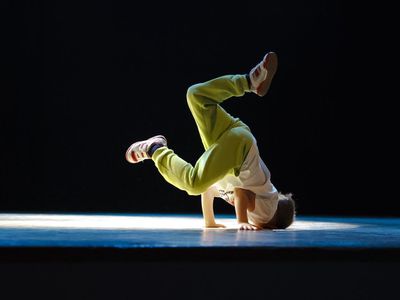 Which dance style heavily influenced breakdancing?