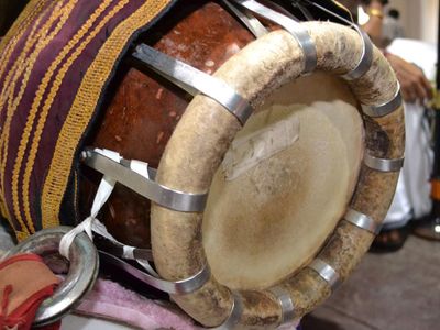 What is the name of the traditional Indian percussion instrument often used in Bollywood music?