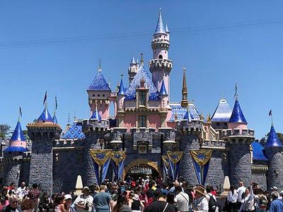 Which company is known for creating the popular theme park Disneyland?