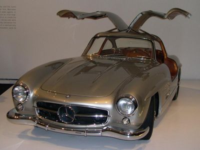 Which classic car features gull-wing doors and was produced from 1954 to 1963?