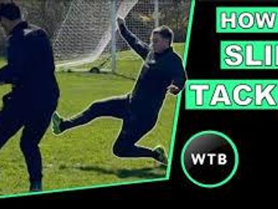 What is the main objective of a slide tackle?