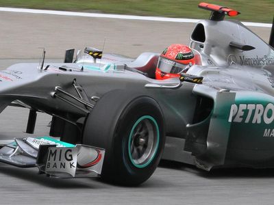 At which circuit did Michael Schumacher achieve his first Formula 1 victory?