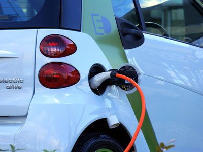 What is the approximate time required to fully charge an electric car using a standard charger?