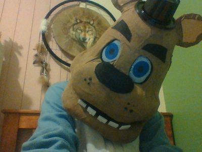 when bored sitting in a owl onesie and have a hand made freddy head.