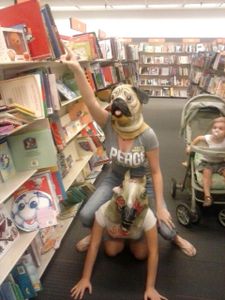 Meanwhile at the bookstore XD (my sister on bottom, me on top)