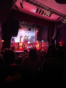 corrosion of conformity- the middle dude  holding the guitar is pepper