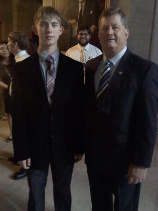 me on the left, the state senator is on the right, and a creepy teacher in the background